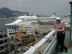 Pam with Regal Princess and Nagasaki harbor beyond